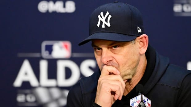 Aaron Boone answers questions after the Yankees’ 6–5 loss to the Guardians in ALDS Game 3.